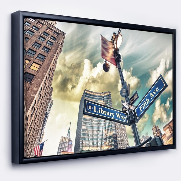 Designart 'Library Way and 5th Avenue Street Signs' Modern Cityscape Framed Canvas Art Print
