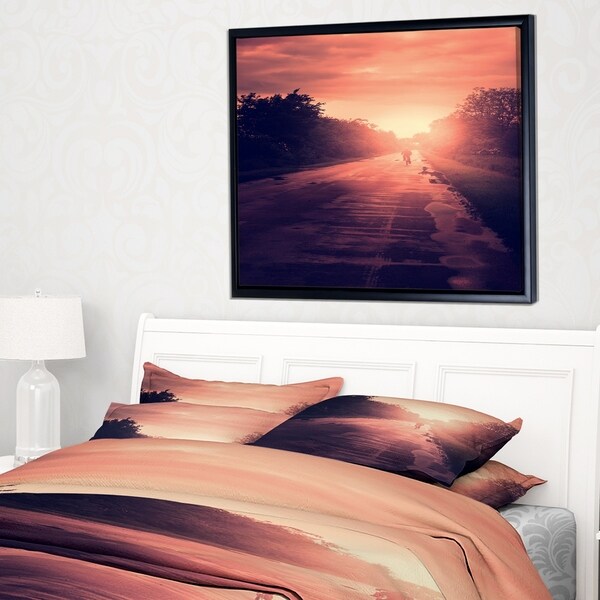 Designart 'Vintage Biker at Sunset' Modern Landscape Wall Art Framed Canvas