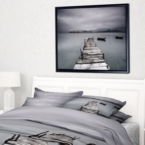 Designart 'Pier and Boats at Seashore' Bridge Framed Canvas Art Print