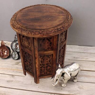 The Curated Nomad Grote Brown Hand-carved Wood Folding Accent Table