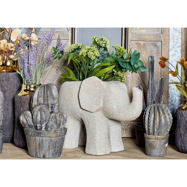 https://ak1.ostkcdn.com/images/products/19557658/14-inch-Traditional-Fiber-Clay-White-Elephant-Planter-4c7b7b35-9137-413e-8b00-2bb42b9036aa_600.jpg