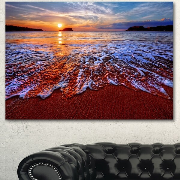 Designart 'Colorful Sunset with Bright Waters' Seashore Art Print on Canvas