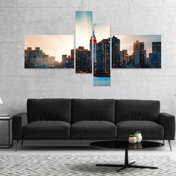 Designart 'Manhattan Skyline at Bright Sunset' Extra Large Canvas Art Print