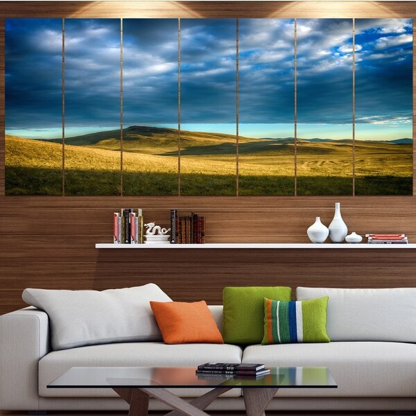 Designart 'Green Landscape under Cloudy Sky' Modern Landscape Art