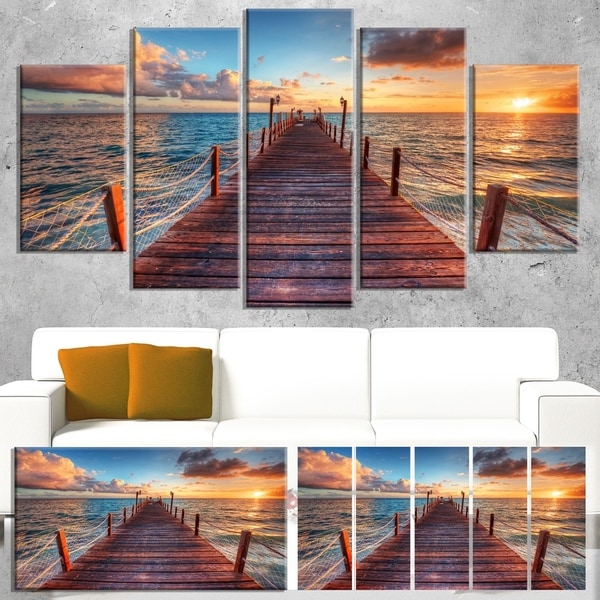 Designart 'Sunset over Wooden Sea Pier' Modern Bridge Canvas Wall Art