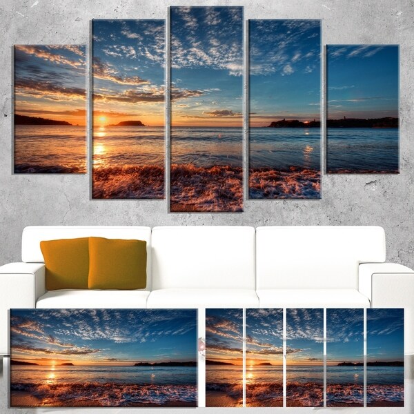 Designart 'Tranquil Beach and Whimsical Clouds' Seashore Canvas Artwork Print