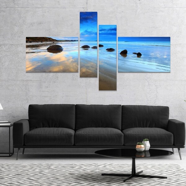 Designart 'Cloudy Sky Over Moeraki Boulders' Seashore Photo Canvas Art Print