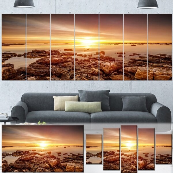 Designart 'Beautiful Sunset Over Rocky Beach' Large Seashore Canvas Artwork Print