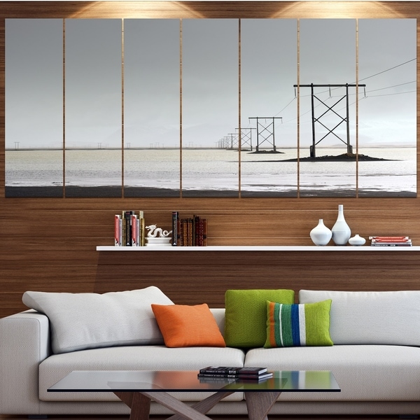Designart 'Electricity Pylons over Lagoon' Landscape Canvas Wall Artwork
