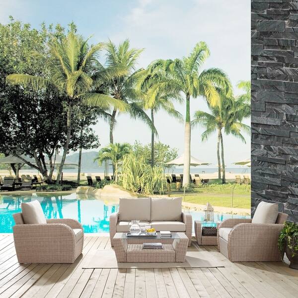https://ak1.ostkcdn.com/images/products/19841805/st-augustine-5-pc-outdoor-wicker-seating-set-with-oatmeal-cushion-loveseat-two-chairs-coffee-table-side-table-9b999fc1-602b-4a5d-8772-54a5d980ef83_600.jpg?impolicy=medium