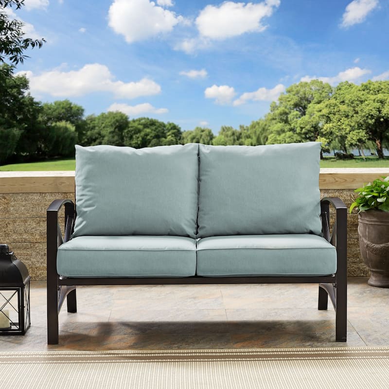 Crosley kaplan loveseat in oiled bronze with mist universal cushion cover