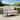 Crosley Kaplan Oiled Bronze Steel Outdoor Loveseat with Oatmeal Cushions - 54 W x 30.5 D x 32 H