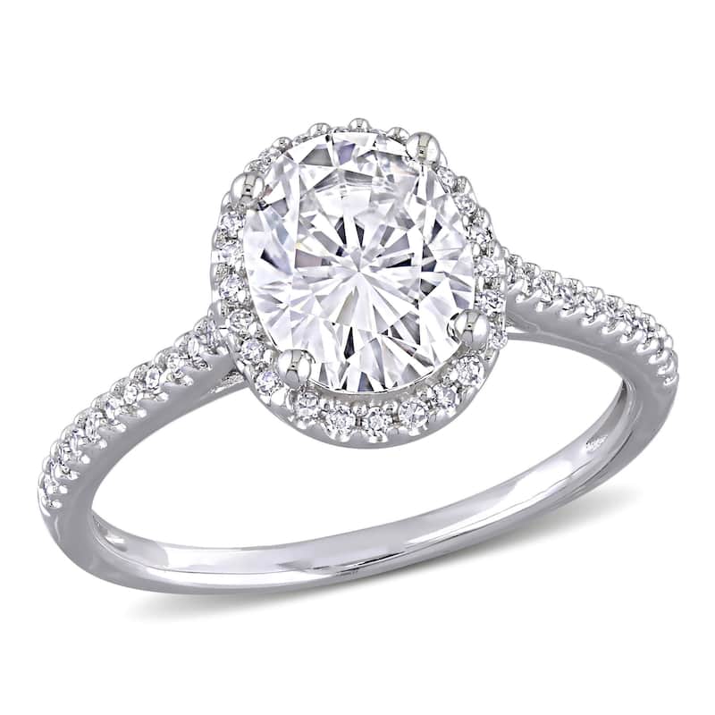 Miadora 2ct DEW Oval-cut Moissanite and 1/4ct TDW Diamond Halo Engagement Ring in 14k White Gold