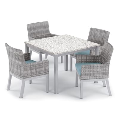 Oxford Garden Travira 5-piece 39-inch Lite-Core Ash Dining Table & Argento Resin Wicker Armchair Set - Ice Blue Cushions