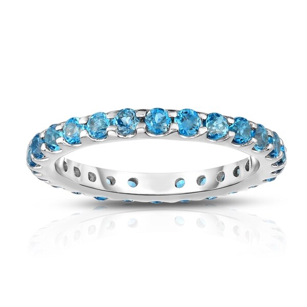 diamond and blue topaz eternity ring