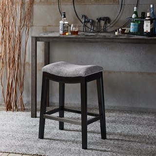 Solid Wood Saddle Bar Stools Are The Perfect cloquet saddle counter stool 20 w x 14 37 d x 27 h 20