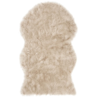 SAFAVIEH Faux Sheep Skin Tawanda Shag Solid Rug