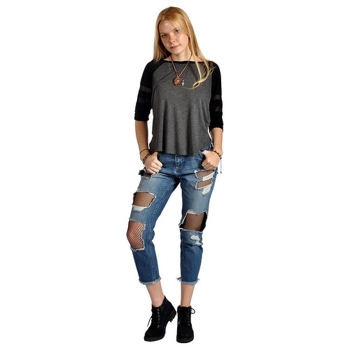 distressed jeans with fishnets