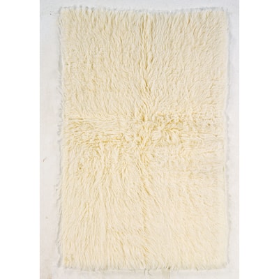 Hand Woven Flokati Wool Rug Collection