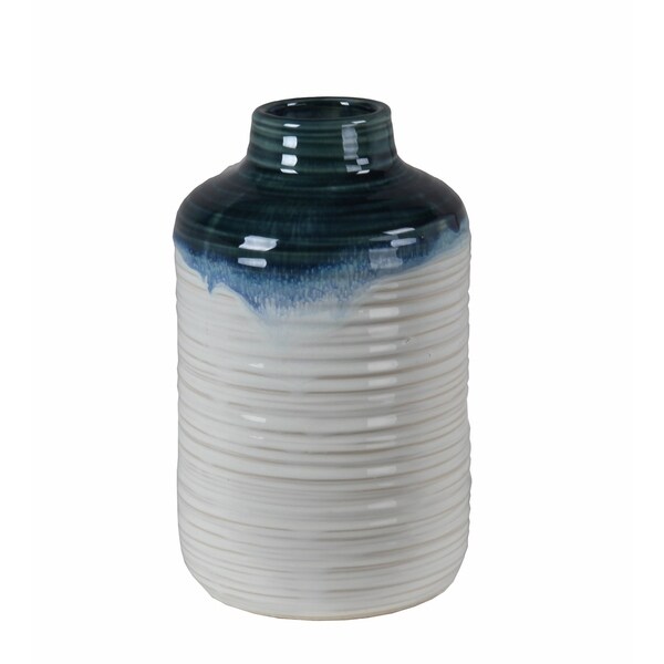 Privilege small white ceramic vase. Featuring Ribbed ceramic body, 6x6x10.