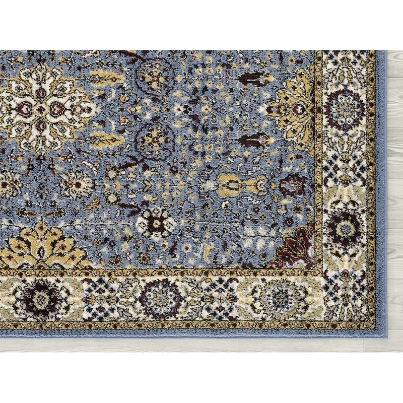 Santaria Sepha Vintage Bordered Area Rug