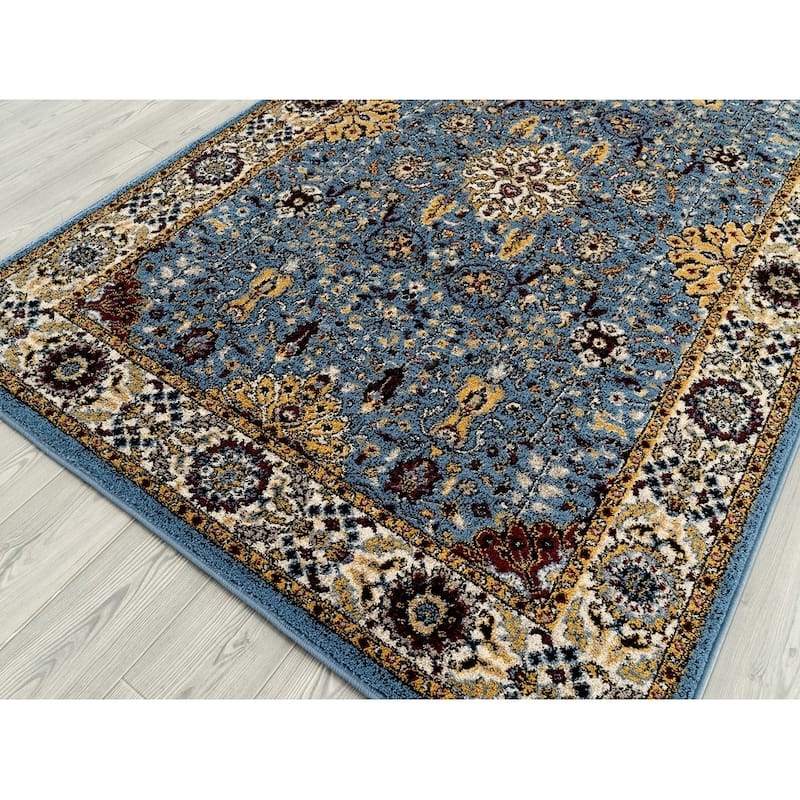 Santaria Sepha Vintage Bordered Area Rug