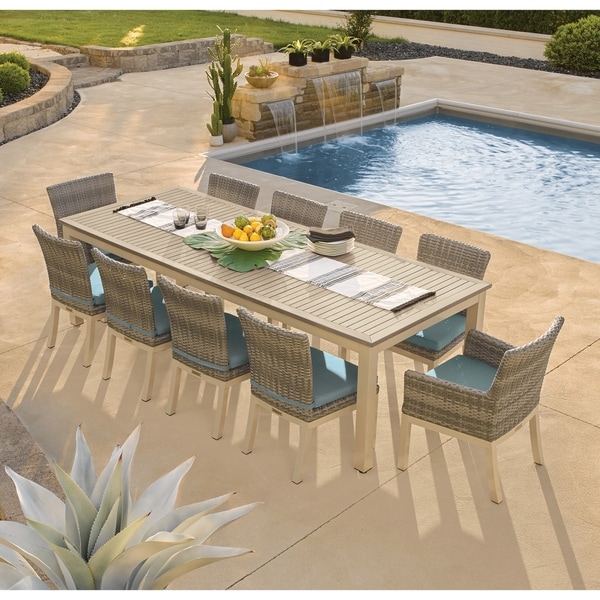 Oxford Garden Travira 11-piece 103-in x 42-in Tekwood Vintage Table & Argento Woven Chair Dining Set - Ice Blue Cushions