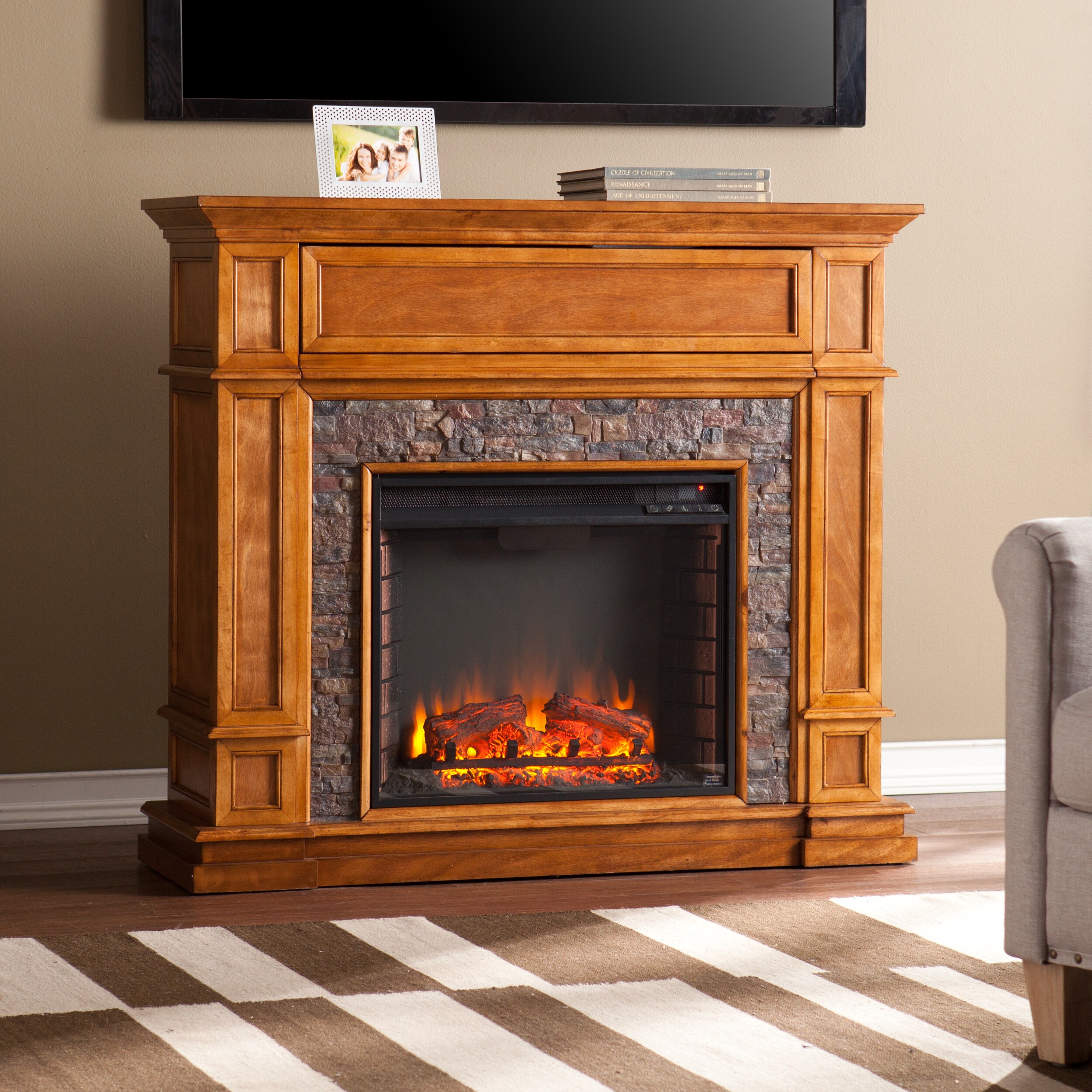Shop Copper Grove Ixia Simulated Stone Media Center Electric