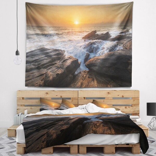 Designart 'Sunset over Rocky Seashore' Beach Photo Wall Tapestry