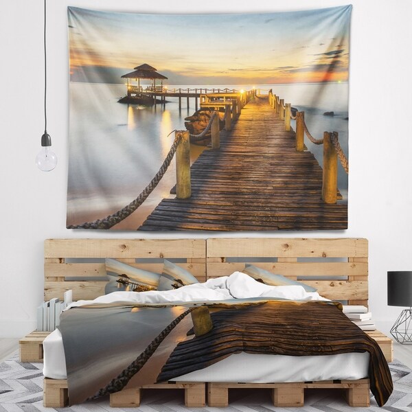 Designart 'Brown Wooden Pier in Evening' Seashore Photo Wall Tapestry