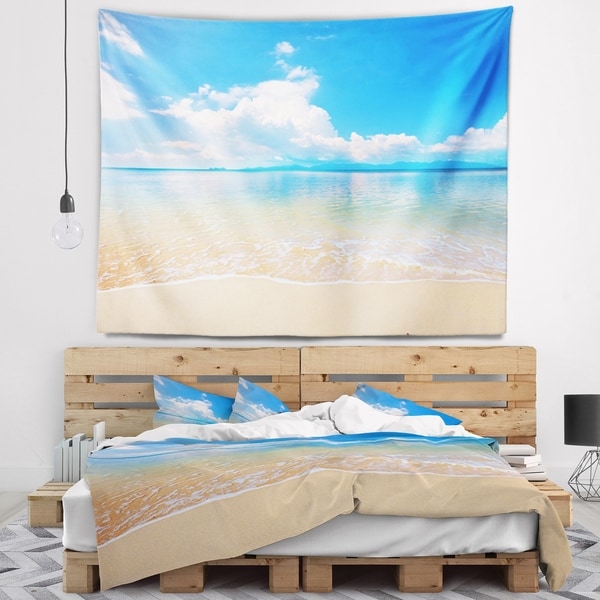 Designart 'Large Clouds Over Calm Beach' Seashore Photo Wall Tapestry