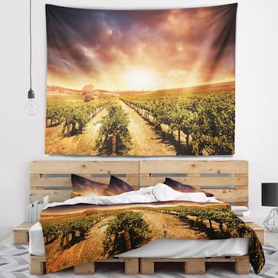 Designart 'Vineyard with Stormy Sunset' Landscape Wall Tapestry