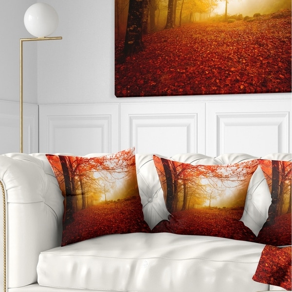 Designart 'Yellow Sun Rays in Red Forest' Landscape Photography Throw Pillow