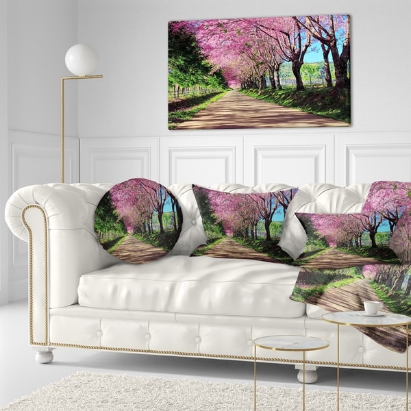 Designart 'Cherry Blossom Pathway in Chiang Mai' Landscape Printed Throw Pillow