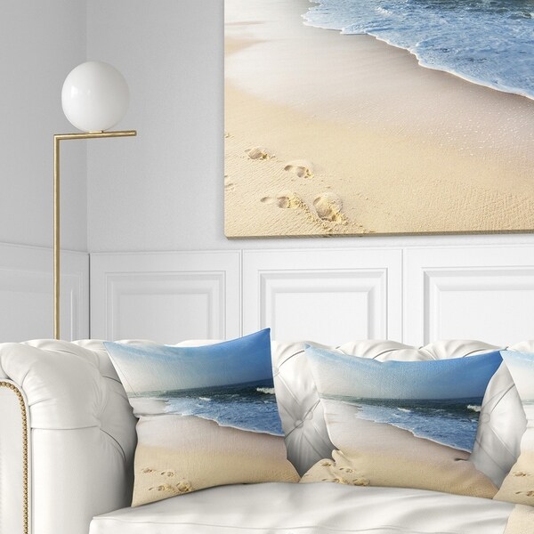 Designart 'Clam Tropical Beach with Footprints' Seashore Throw Pillow