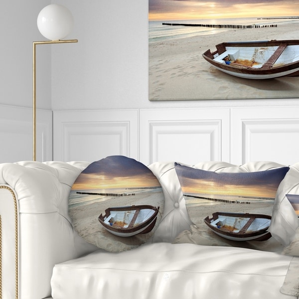 Designart 'Boat on Beautiful Sunrise Seashore' Beach Throw Pillow