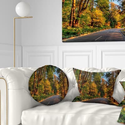 Designart 'Road through Lit up Fall Forest' Landscape Printed Throw Pillow