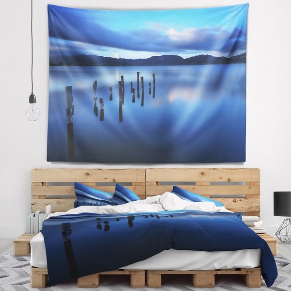 Designart 'Dark Blue Sea with Pier Remains' Seascape Wall Tapestry