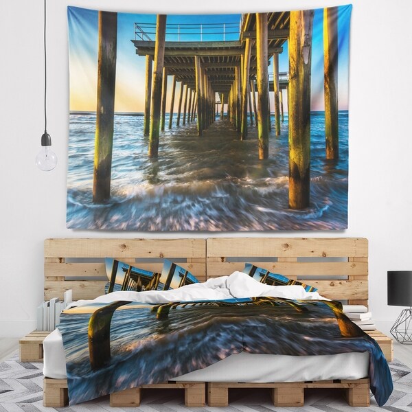 Designart 'Fishing Pier and Waves at Atlantic Sea' Pier Seascape Wall Tapestry