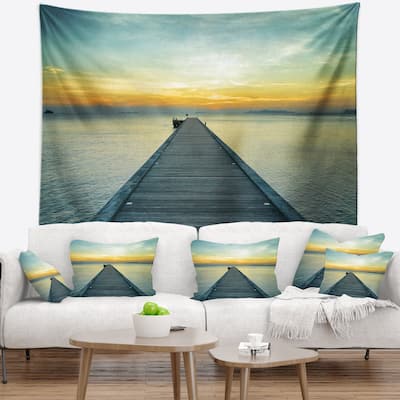 Designart 'Wood Pier into the Yellow Blue Sea' Wooden Sea Bridge Wall Tapestry