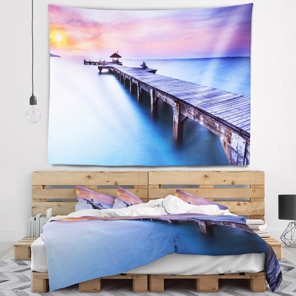 Designart 'Beach with Blue Waters and Wood Bridge' Pier Seascape Wall Tapestry
