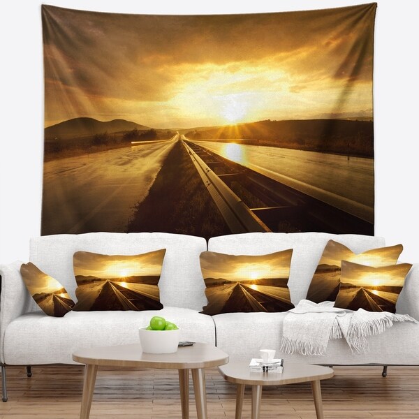 Designart 'Wet After Rain Road at Sunset' Landscape Wall Tapestry