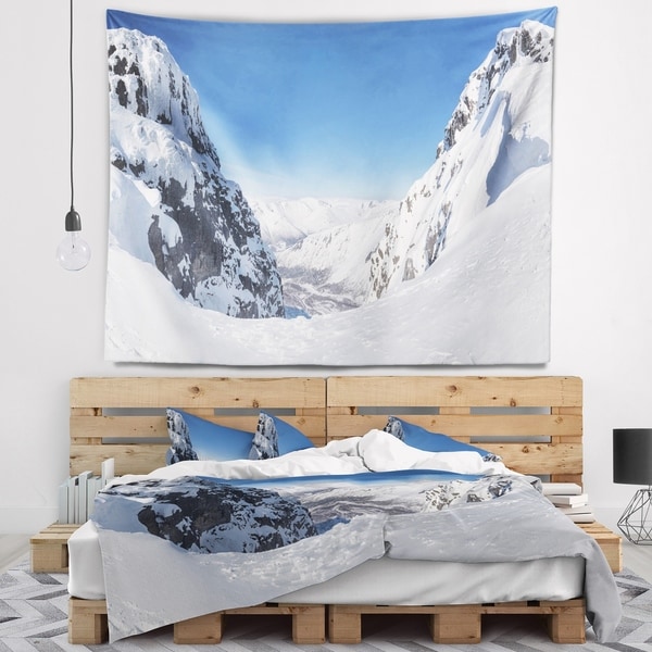 Designart 'Pass in the Northern Winter Hills' Landscape Wall Tapestry