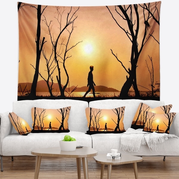 Designart 'Man Walking Alone in Evening' Landscape Photography Wall Tapestry