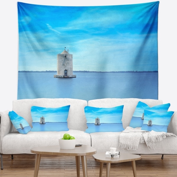 Designart 'Old Spanish Windmill in Blue Lagoon' Seashore Wall Tapestry