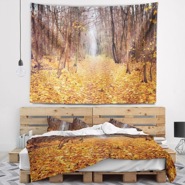 Designart 'Yellow Fallen Leaves in Morning' Landscape Photography Wall Tapestry