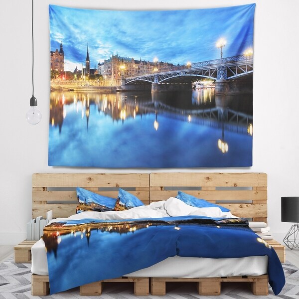 Designart 'Illuminated Blue Stockholm' Cityscape Wall Tapestry