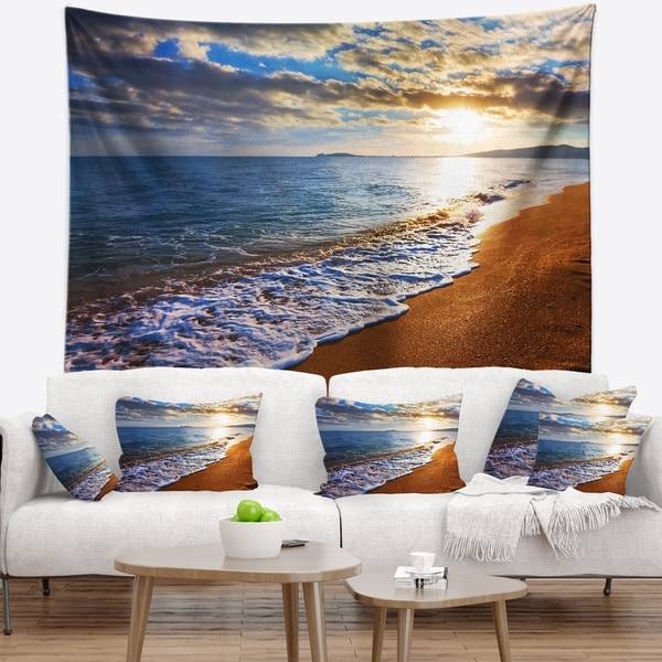 Designart 'Heavy Clouds Over Morning Beach' Seashore Wall Tapestry