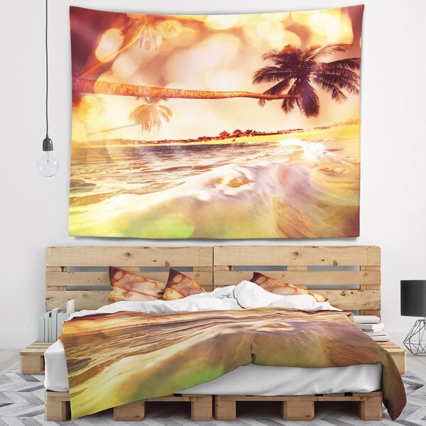 Designart 'Tropical Beach with Bent Coconut Palms' Modern Beach Wall Tapestry