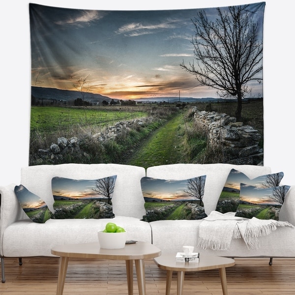 Designart 'Rocky Fences in Green Grassland' Landscape Wall Tapestry